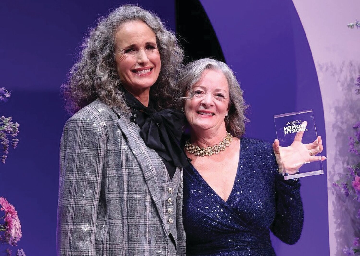 Actress and L’Oreal Paris spokeswoman Andie MacDowell presented Cass Forkin, founder and president of Jamison-based Twilight Wish Foundation, with her “Women of Worth” award.