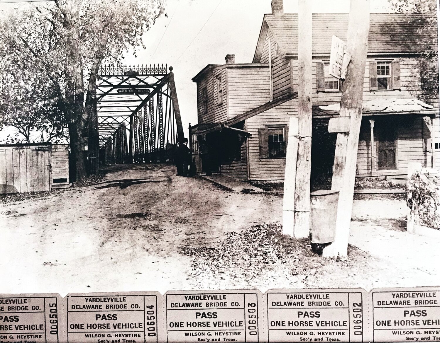 In 1904, a steel river bridge was erected to replace the wooden covered bridge that was lost in the 1903 flood. A toll collector’s house stood at the approach.