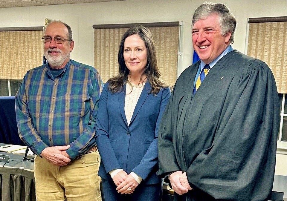 Newly minted Tinicum Township Supervisor John Cole, left, stands with board chair Eleanor Breslin and Judge Gary Gambardella, who administered Cole’s oath of office on Jan. 2.
