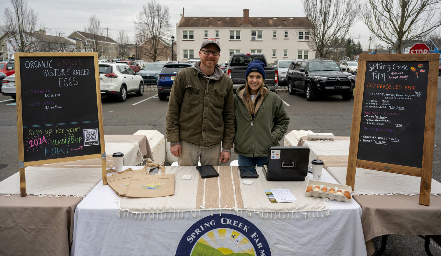 Matt Dingle and Julia Major, of Spring Creek Farm in Solebury, hope for a lucrative morning.