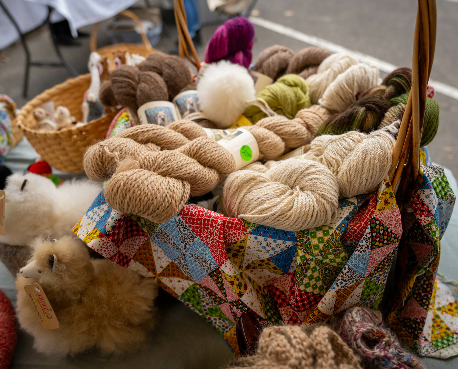 Hobble Hill Farm in Bedminster Township sells items made of wool from Suri alpacas at the Yardley Farmers Market.