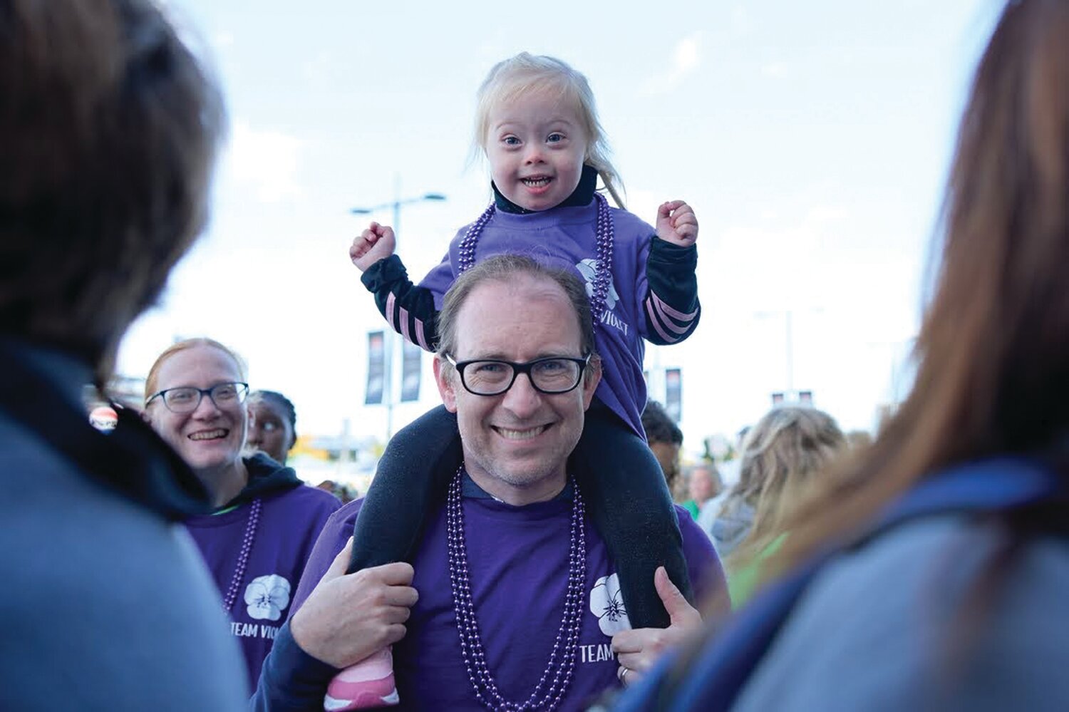 Bucks County Herald Editor John Anastasi carries daughter Violet, 3, on his shoulders at the Oct. 8 Buddy Walk at Lincoln Financial Field to benefit the Trisomy 21 Clinic at Children’s Hospital of Philadelphia. October is Down Syndrome Awareness Month.