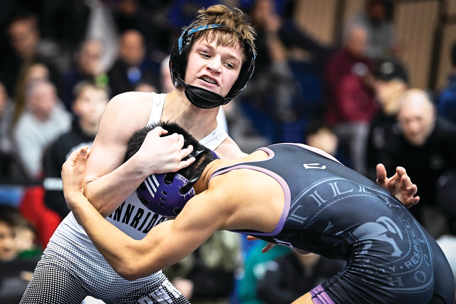 Pennridge’s Colby Martinelli during a 107-pound semifinal 7-1 victory against Carter Shin of Chantilly High School.