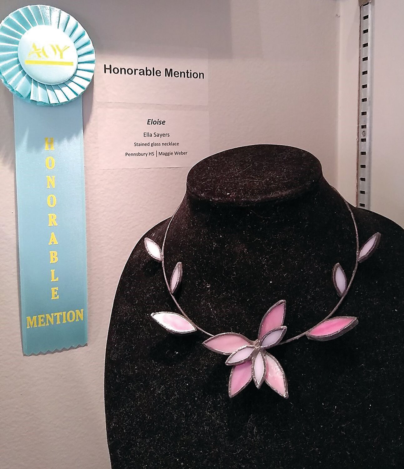 Honorable Mention “Eloise” by Ella Sayers of Pennsbury High School is a necklace in stained glass.