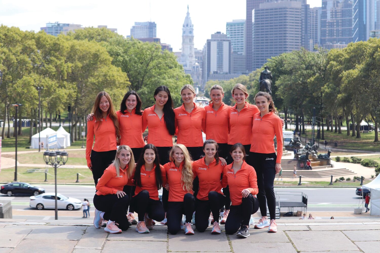 Veronica Eder, front row, center, and the Liberty Track Club are one of the top female running clubs in the Philadelphia area.