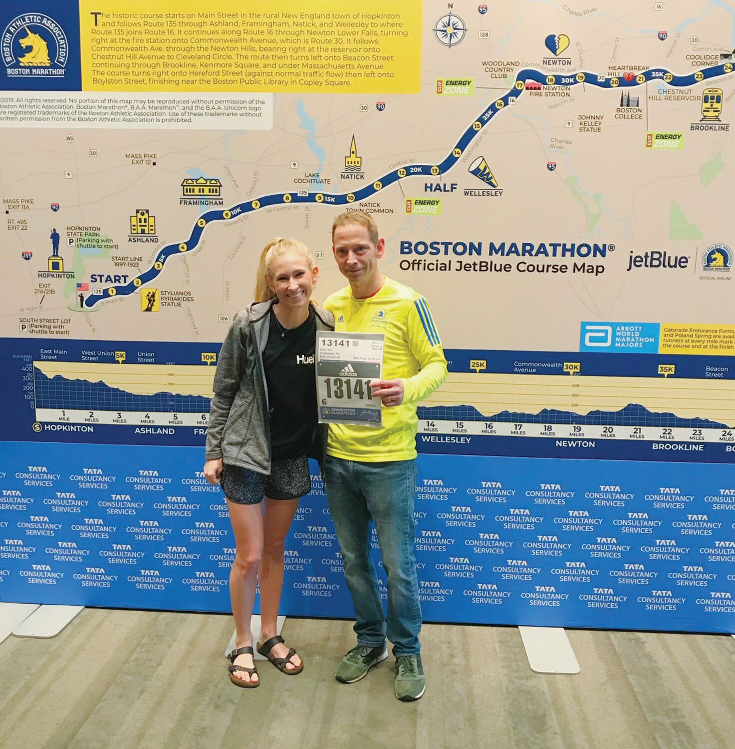 Proud daughter Veronica Eder stands next to her dad, Jim, after he completed the 2019 Boston Marathon in a time of 2:59 at age 52.