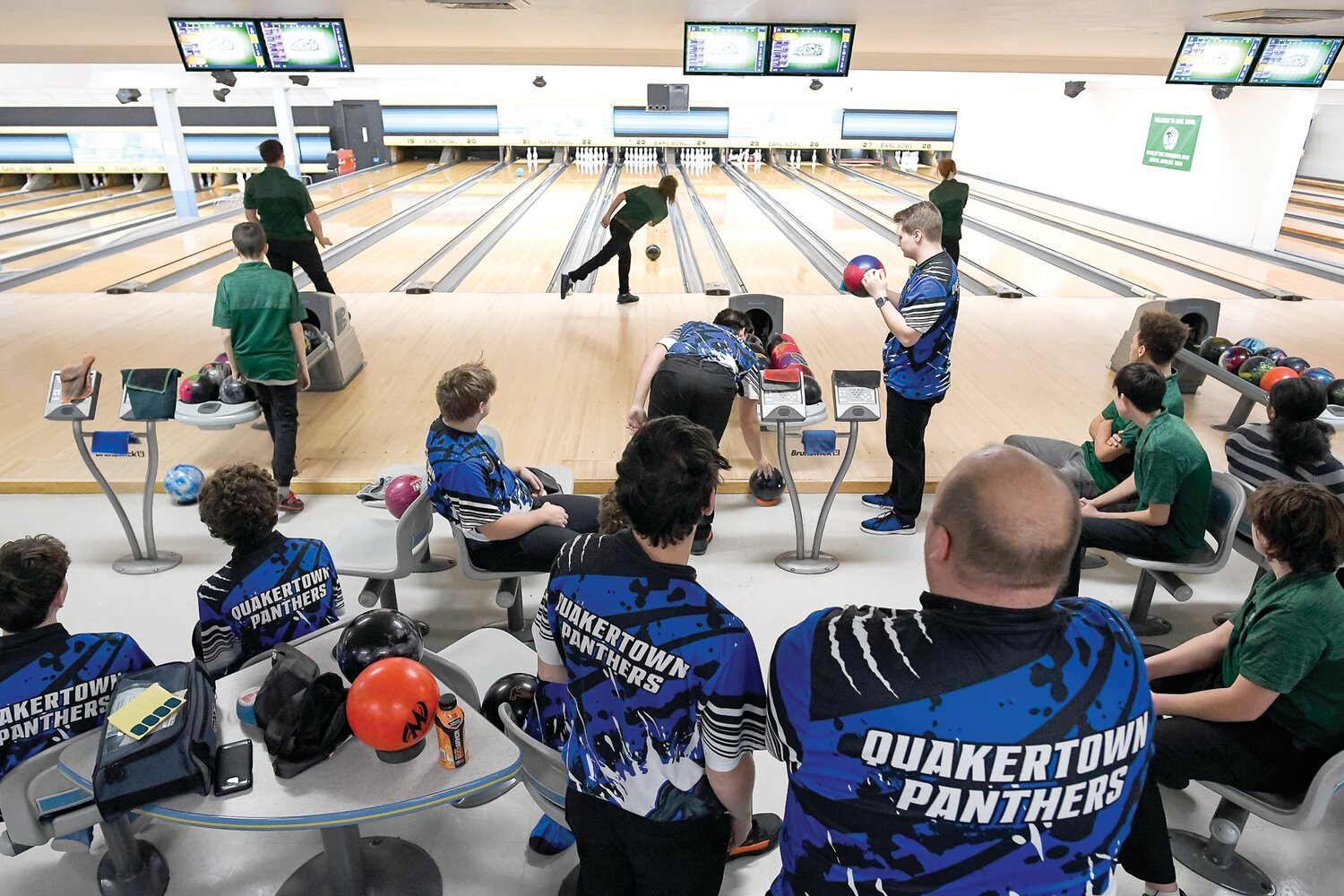 Quakertown and Pennridge bowling teams compete at Earl-Bowl Lanes Jan. 22. Although competitors during the match, both teams are friendly outside of competition.