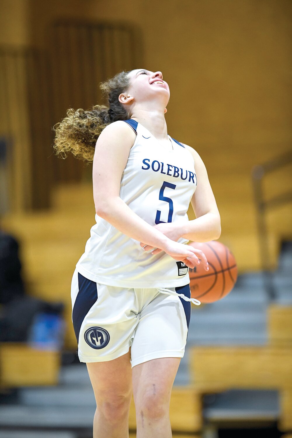 Solebury School’s Hanna Shmuckler can only laugh as a foul is called on her breakaway layup.