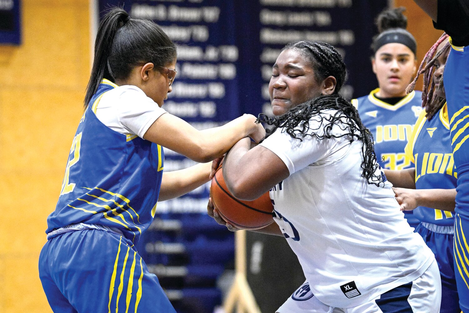Solebury School’s Autumn Turner and City’s Jannah Muhammad battle for a rebound in the third quarter.