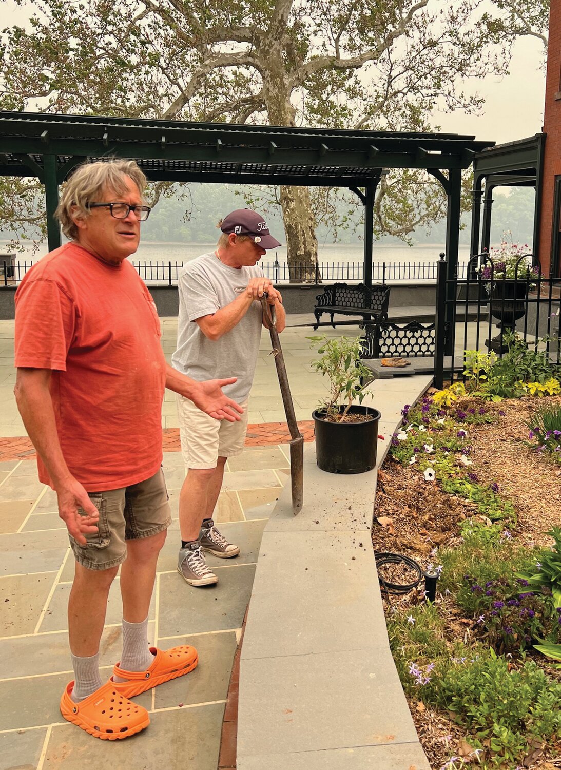 Michael Bowell, owner and lead garden designer at Chester County-based Create A Scene Inc., works in Margaret’s Garden.