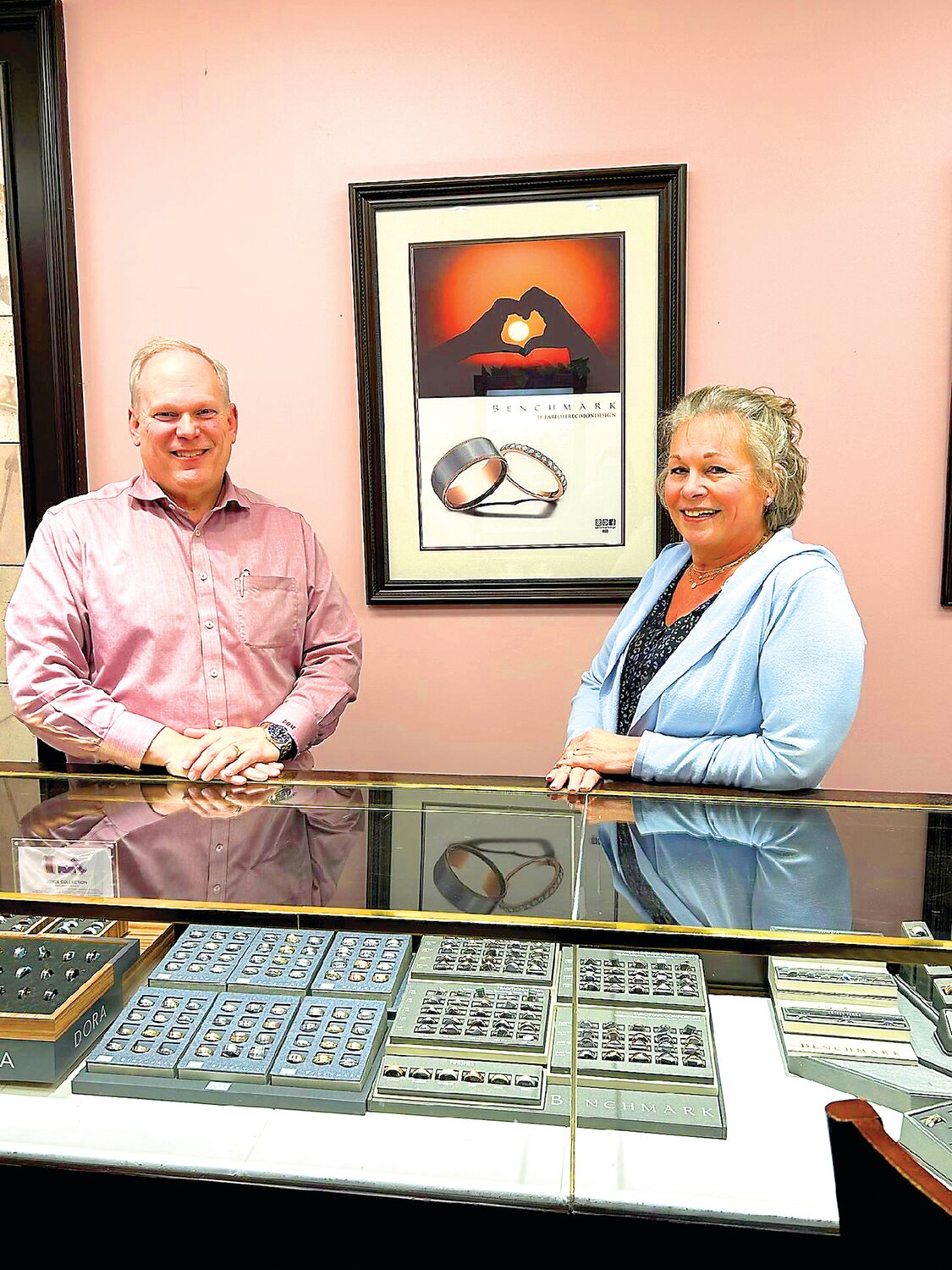 Doug Mortimer and Kathi Stefany have fun selling jewelry to people marking happy occasions.