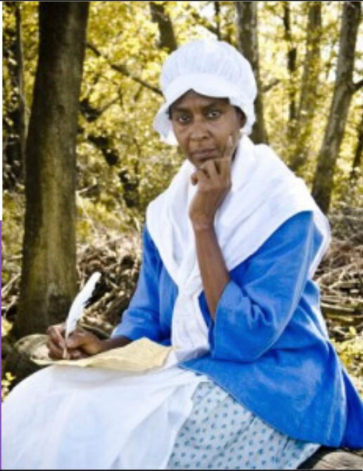 Dr. Daisy Century of American Historical Theatre portrays Phillis Wheatley, the first published African American poet in United States history.
