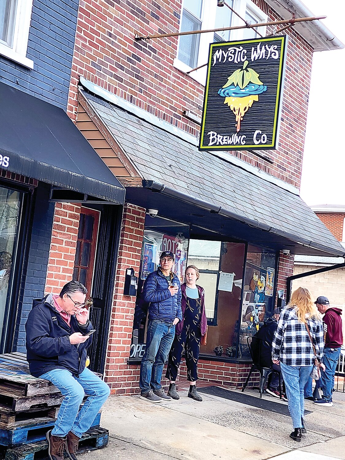 Folks gather outside Mystic Ways Brewing Co., one of the Perkasie Ale Trail stops.