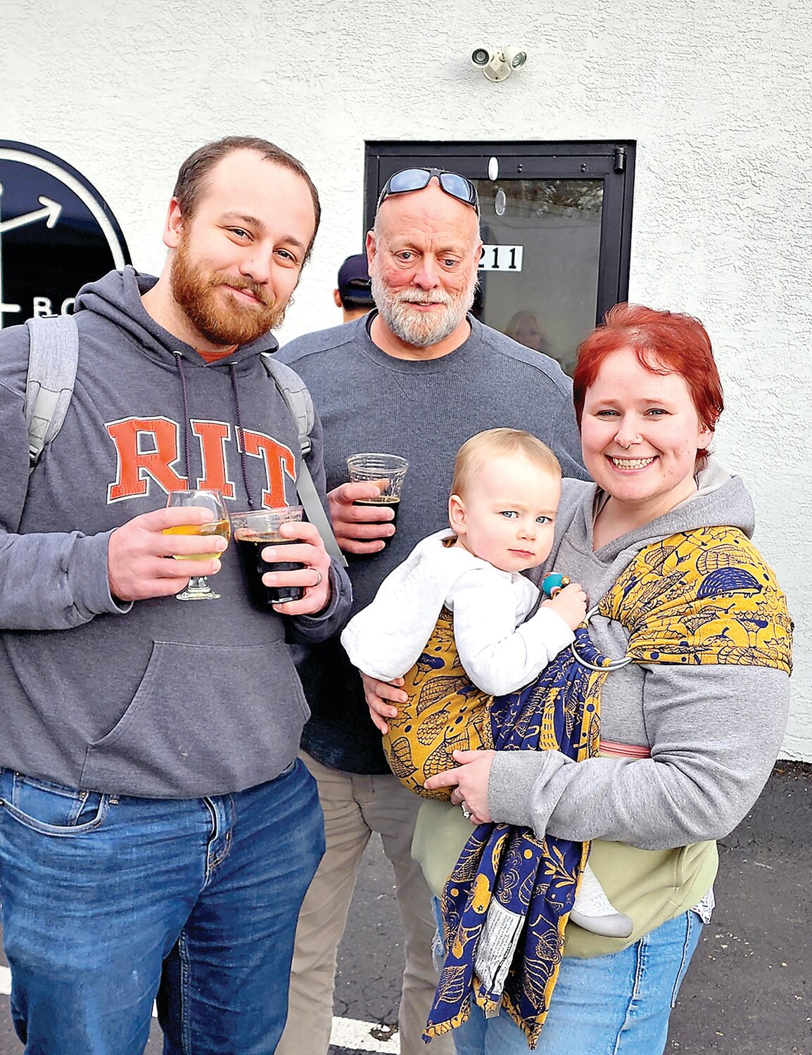 Sean Bayley and his son, Kevin, and Olivia and Alice Bayley make their first Perkasie Ale Trail stop.