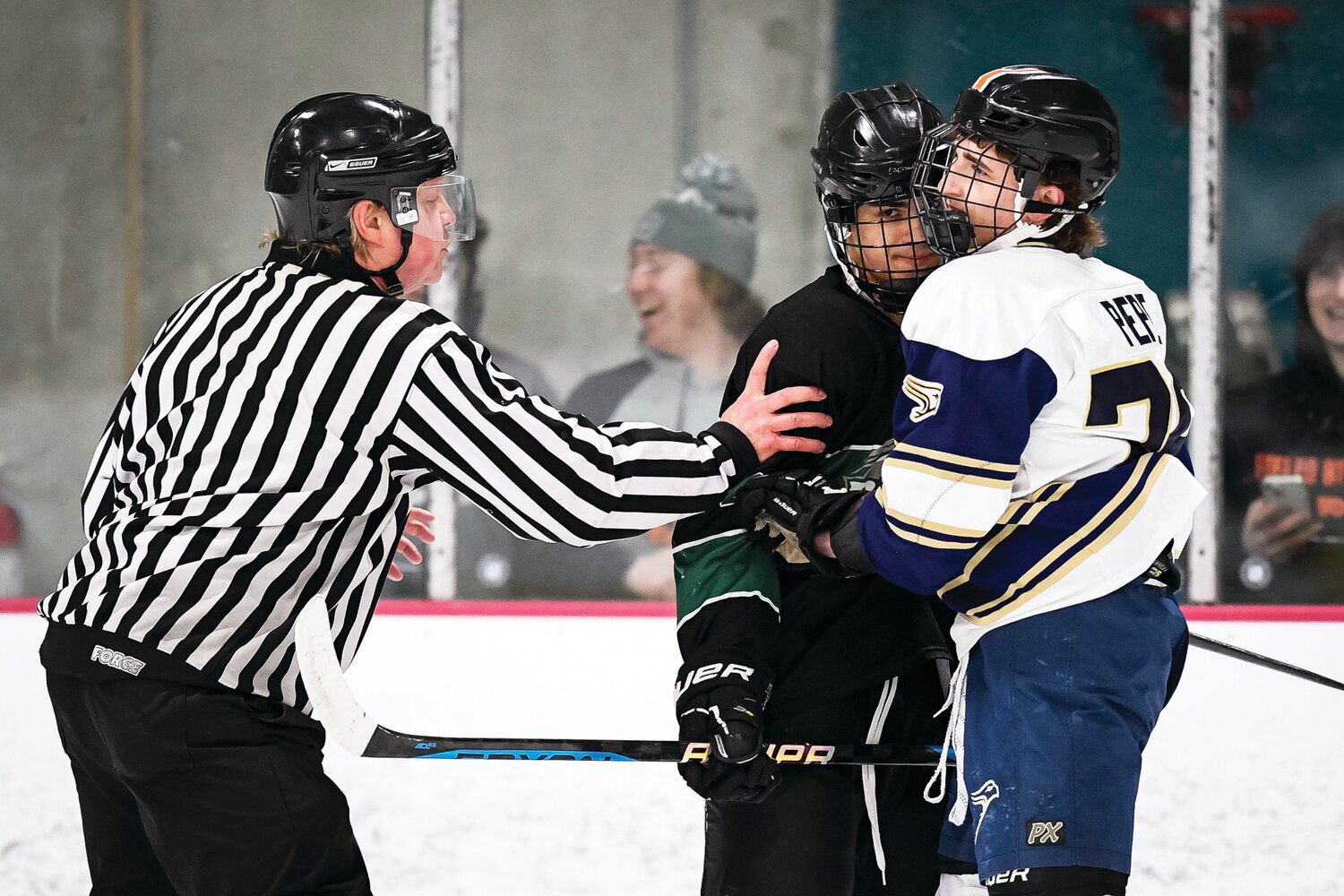 Pennridge’s Tyler Manto and Council Rock South’s Blaize Pepe exchange words and have to be separated during the second period.