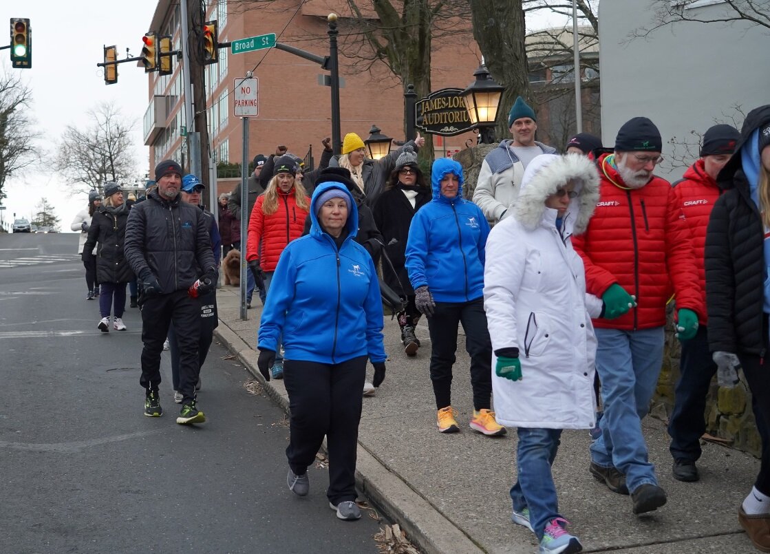 Walkers take part in the 2023 Coldest Night of the Year, a family-friendly winter fundraising walk to support programs and services for those experiencing homelessness and hunger through collective efforts in Bucks County.