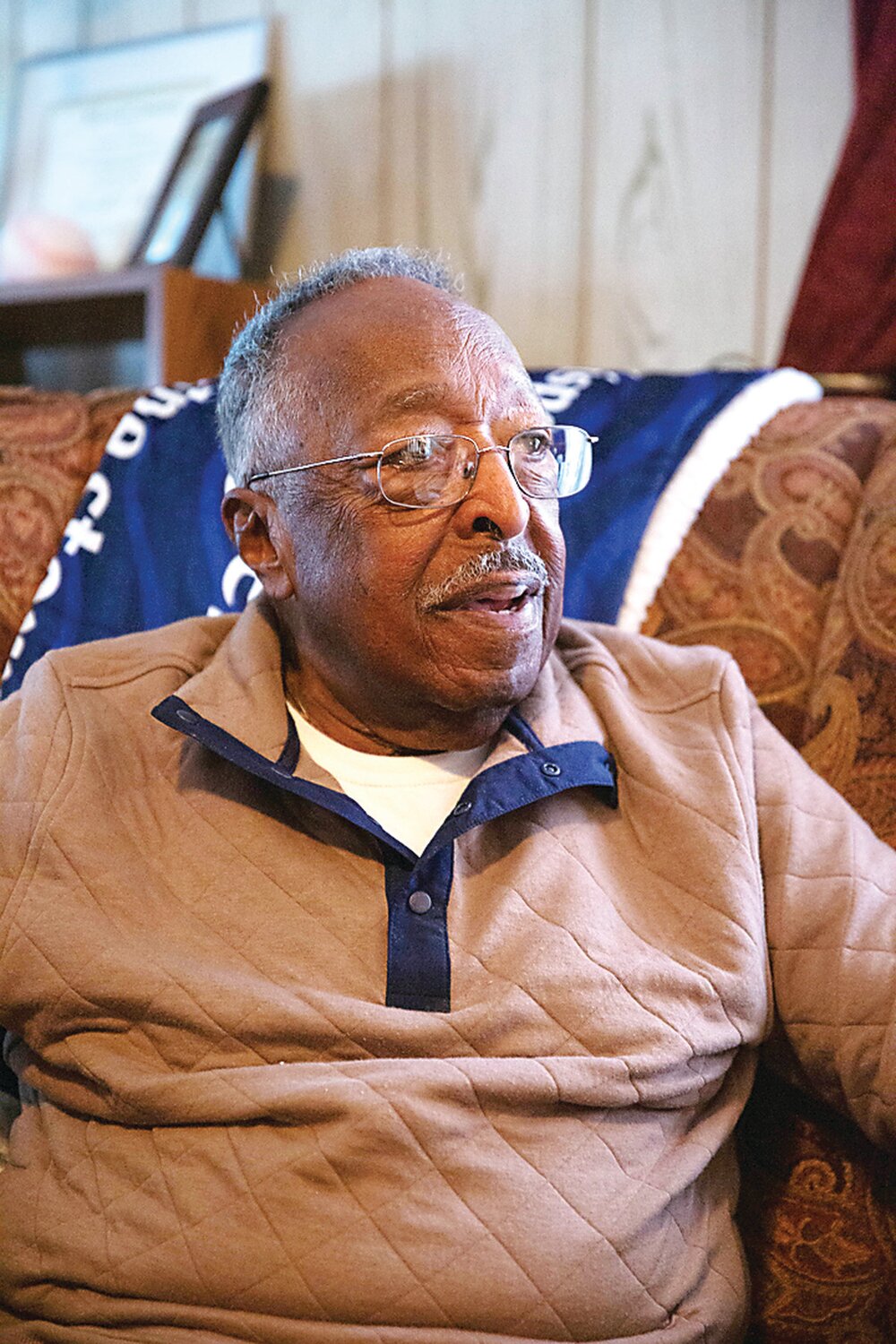 Granville “Sonny” Mayo sits in his home on Pennsylvania Avenue in Yardley. He recalls the entire row of 15 homes on his family’s side of the street being mostly owned and lived in by African American families.