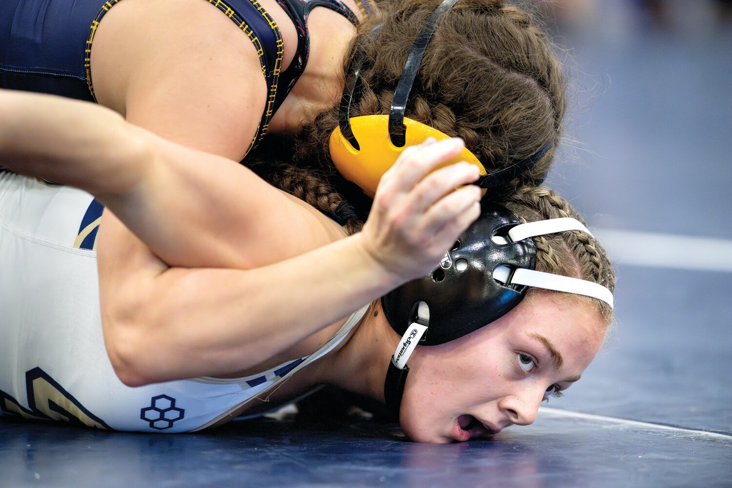 Council Rock South’s Chloe Windsor gets taken down by Cheltenham’s Ciara Rodriguez in the 142-pound class.