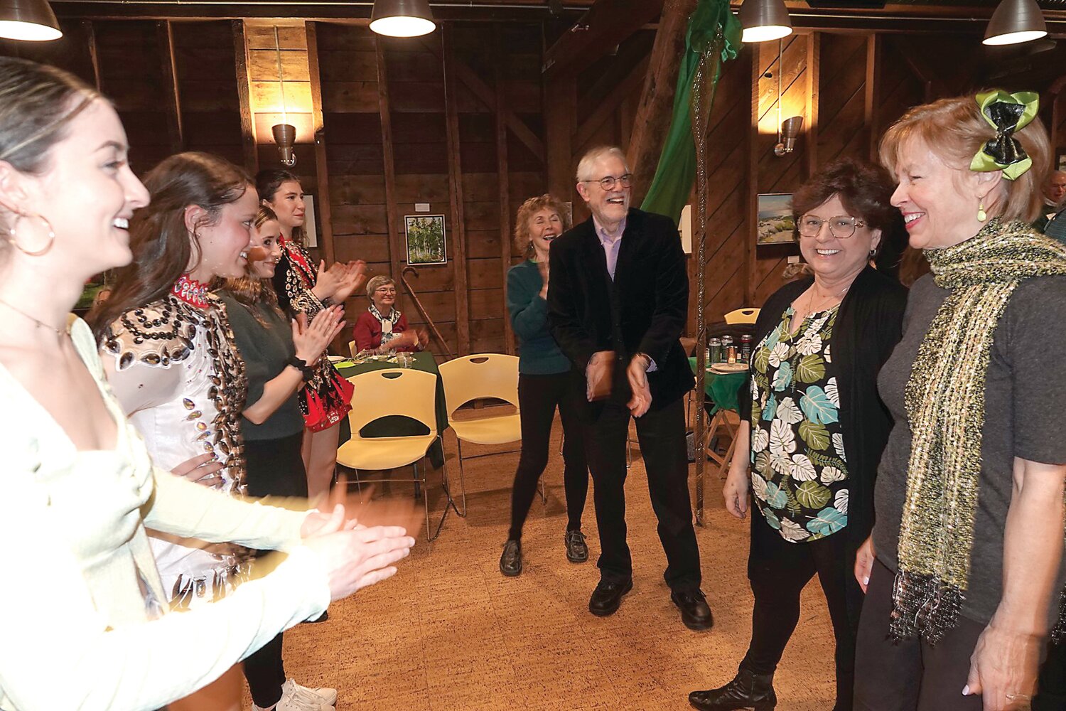 Guests enjoy an Irish dance with friends at the Celebrate the Green event last March.