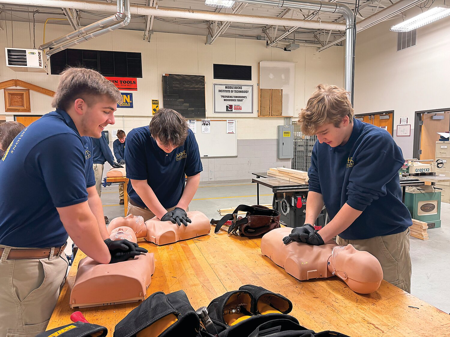 Building trades students at Middle Bucks Institute of Technology participate in CPR training.