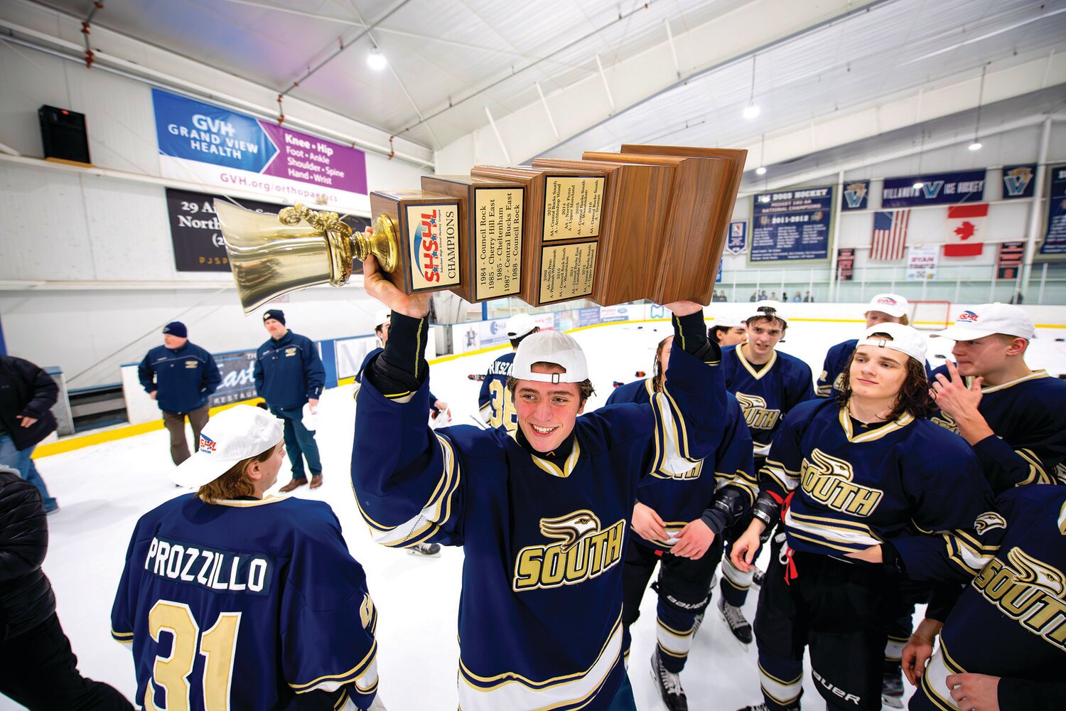 Council Rock South’s James Diiulio skates around after getting the Suburban High School Hockey League trophy.