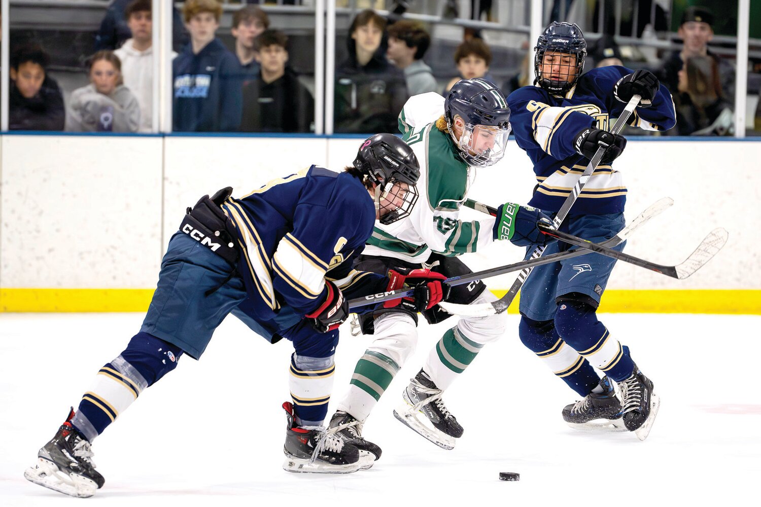 Council Rock South’s Jake Weiner stick checks the puck away from Pennridge’s Kevin Pico during the second period of the Suburban High School Hockey League final.