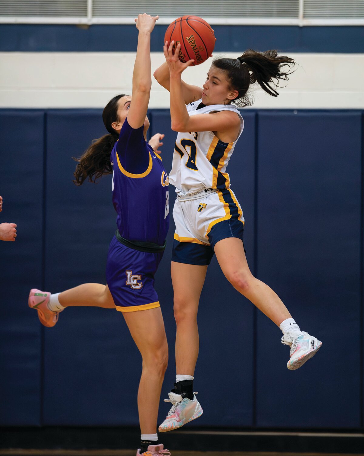 New Hope-Solebury’s Isabella Elizondo gets to an offensive rebound in front of Lancaster Catholic’s Gemma Navickas in the first quarter.