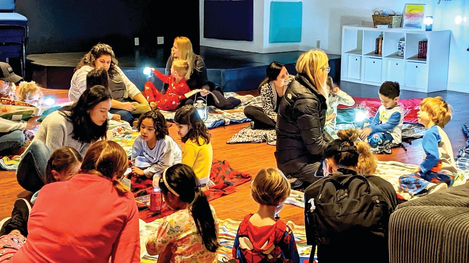 For Read Across America Week, Woodside Christian Preschool in Yardley transformed a room into a campfire setting complete with sleeping bags, lanterns and a virtual campfire. Parents came into the school throughout the morning to read to their child’s class and share their favorite stories.