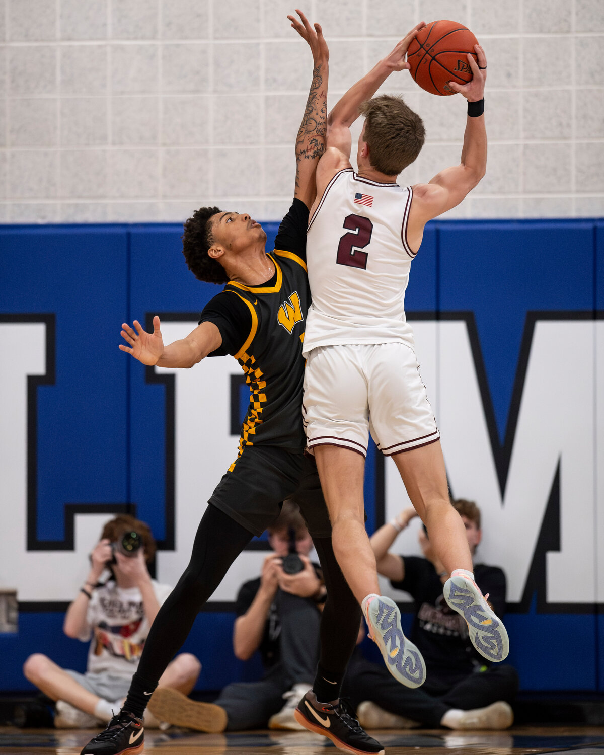 Archbishop Wood’s Jalil Bethea blocks a shot attempt from Lower Merion’s Adam Herrenkohl in the second quarter.