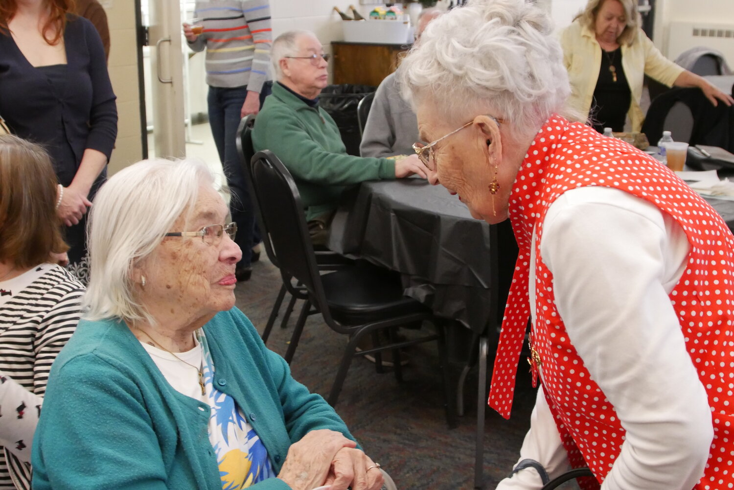 At the Central Bucks Senior Center in Doylestown, Mae Krier, 98, right, one of the original Rosie the Riveters of WWII, speaks to another original Rosie, Rita Colella, who is approaching her 102nd birthday in April.