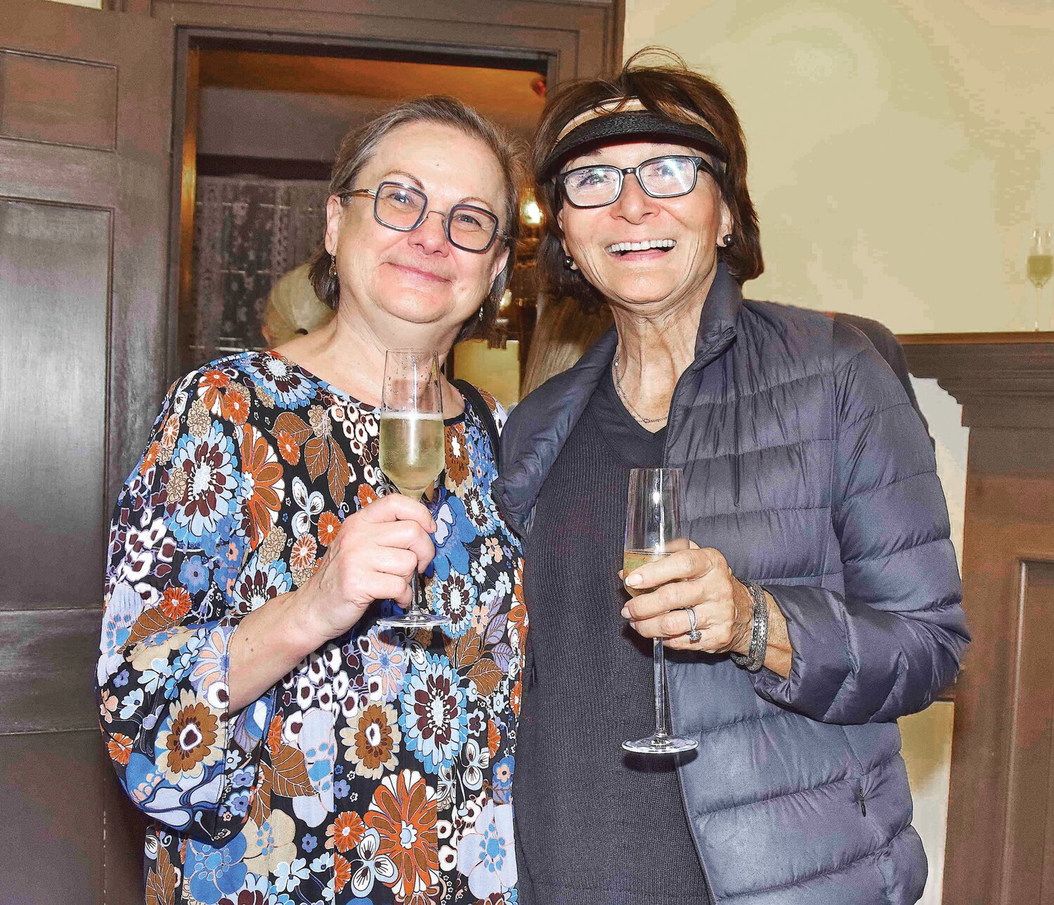 Visitors Jane Vitart and Karen Fischer enjoy the champagne.