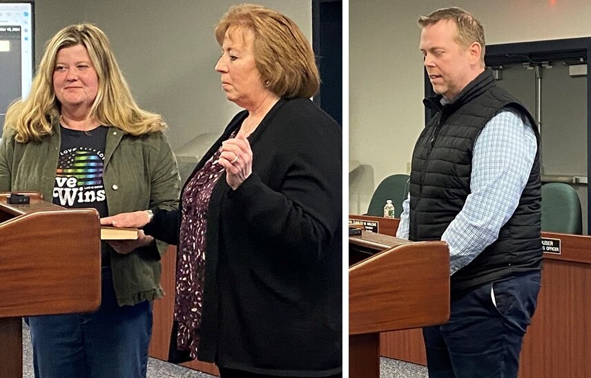 Jenine Zdanowicz, of Warwick, and Rob Dugger, of Warrington, take the oath of office at Monday night’s Central Bucks School Board meeting.