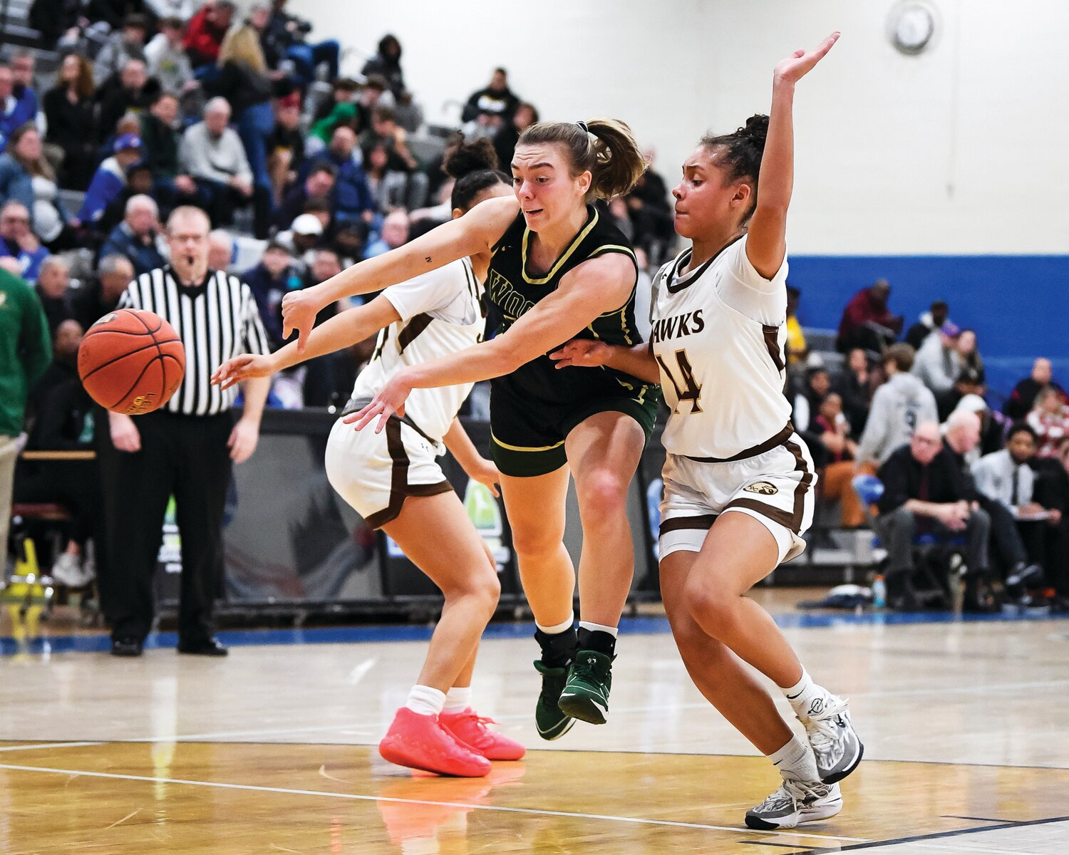 Archbishop Wood’s Ava Renninger with a no-look pass in between the double team of Bethlehem Catholic’s Daviana Jones and Aliyah Brame.