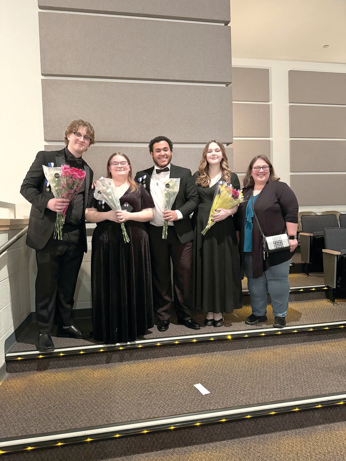 From left are: Ethan Hinshaw, Samantha Bajek, Emiliano Quinones,  Margaret MacAdams and Bensalem High School Choral Director Raegan Ruiz.