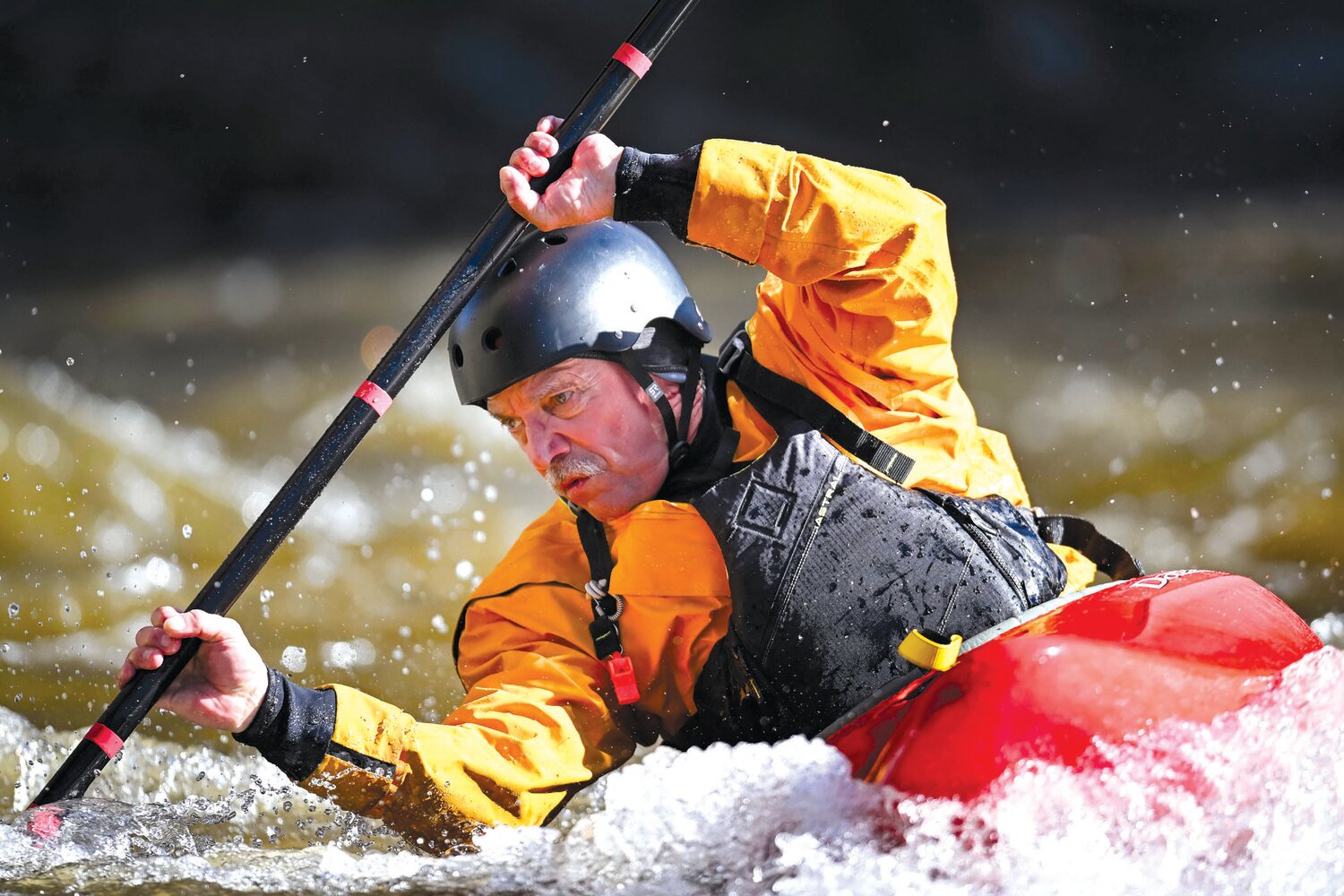 A kayaker navigates the rapids on the Tohickon Creek.