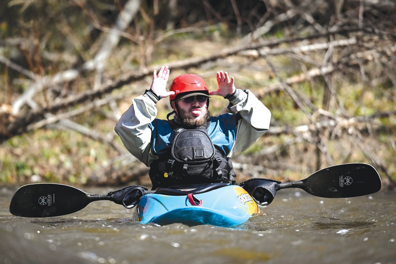 A kayaker has fun with other kayakers on the Tohickon Creek Saturday afternoon.