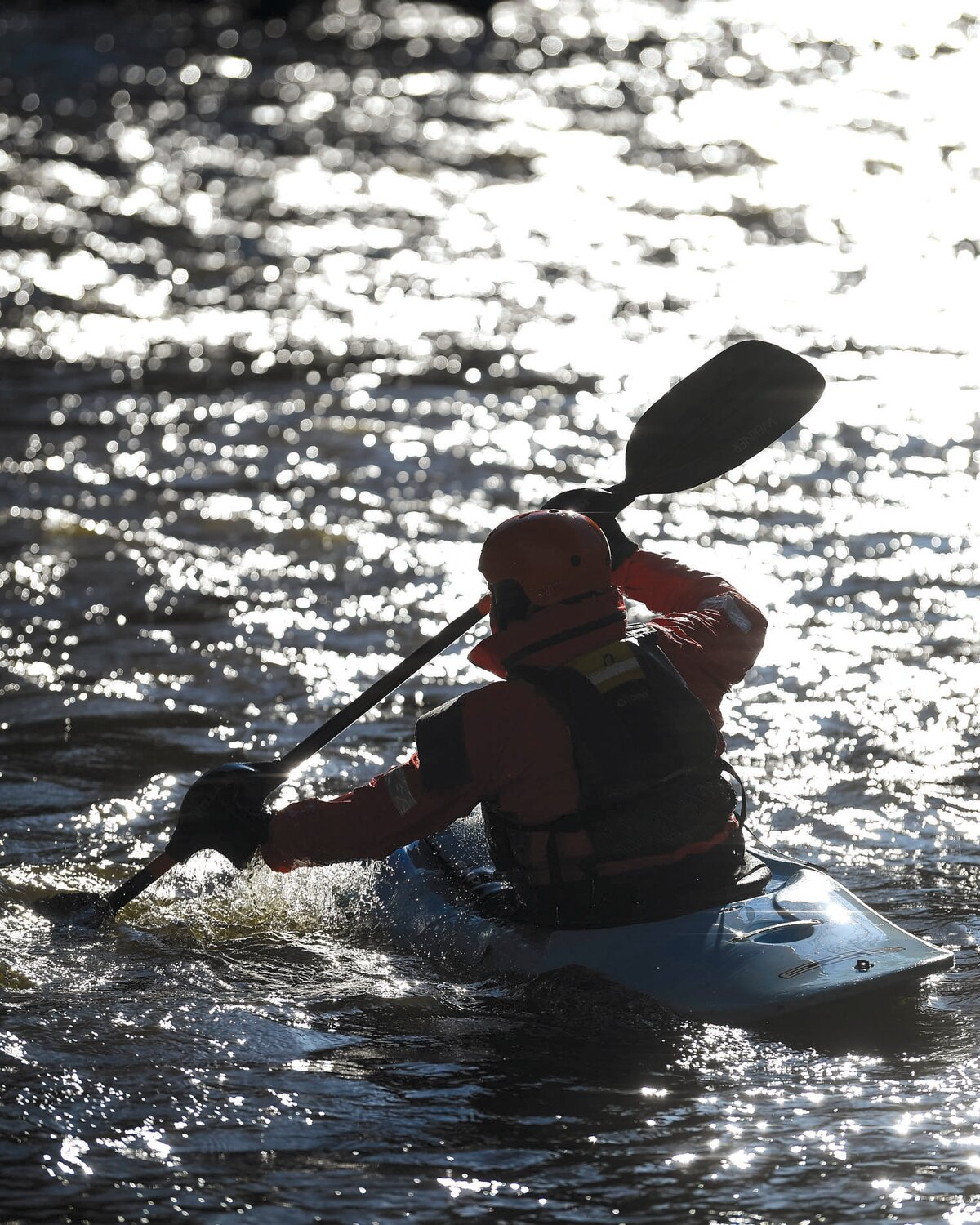An early morning kayaker heads out on Saturday.