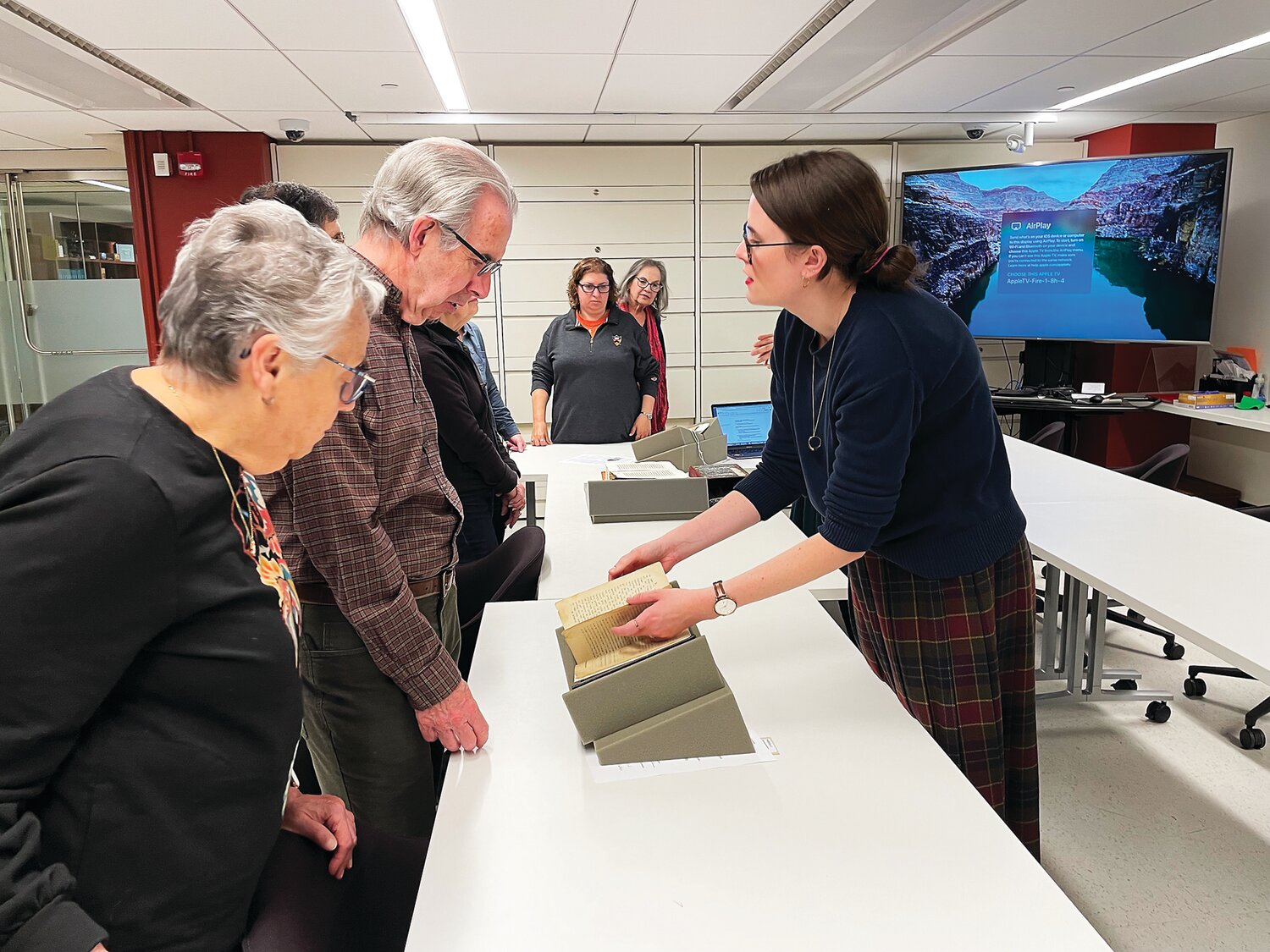 Emma Sarconi, outreach and reference professional for Special Collections at Princeton University Library, describes ancient texts to KHN members.