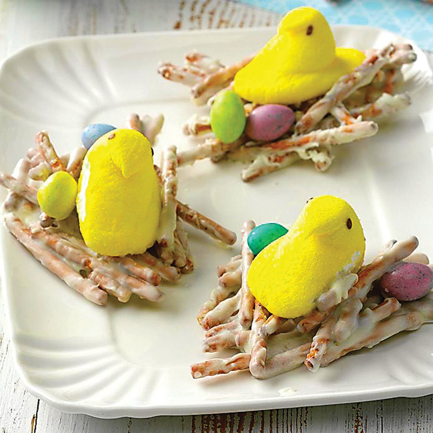 Pretzels and Just Born marshmallow Peeps are materials for colorful Easter treats.