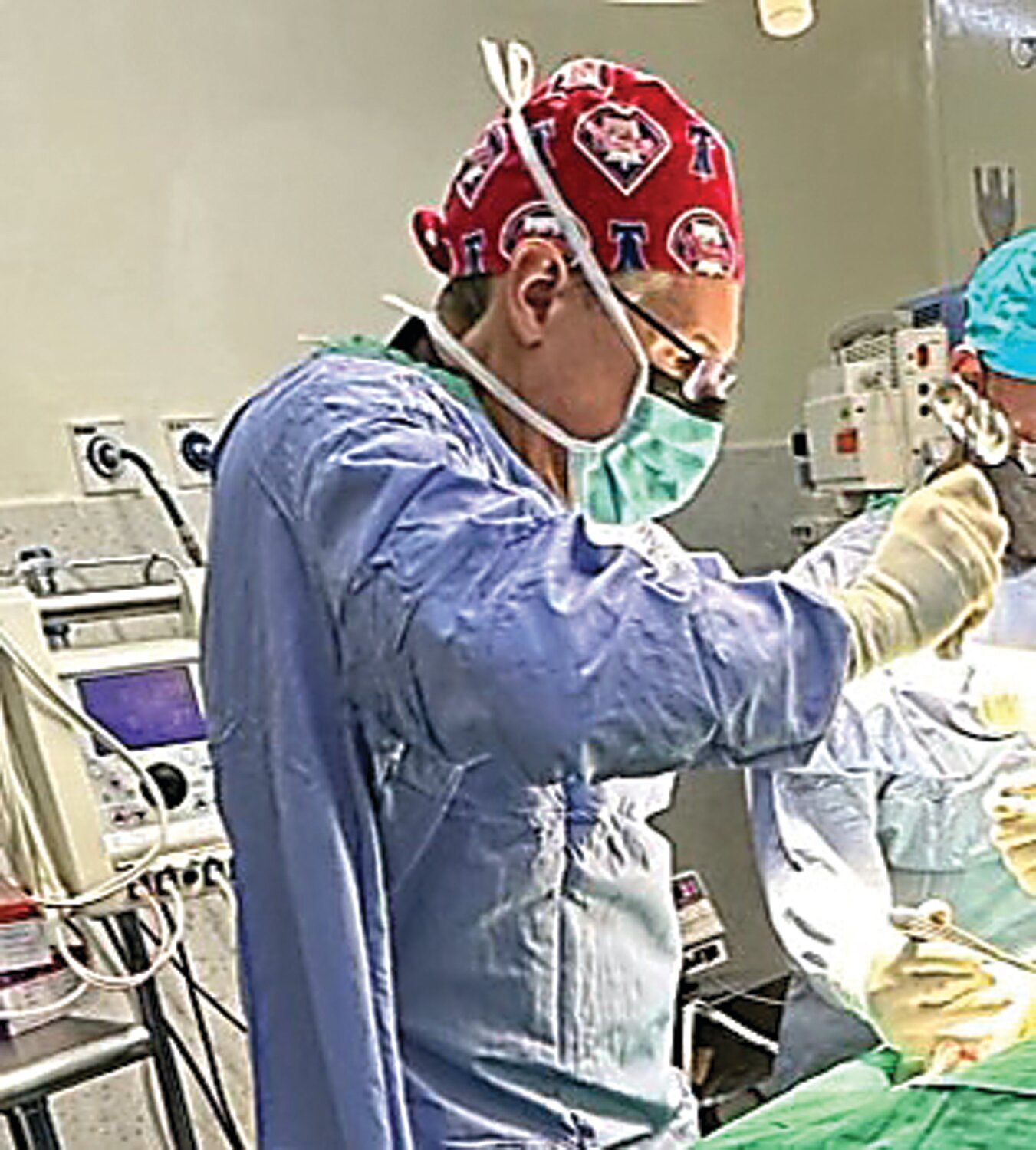 Dr. Eric Gokcen prepares to perform a surgical procedure in a Kenyan operating room suite.