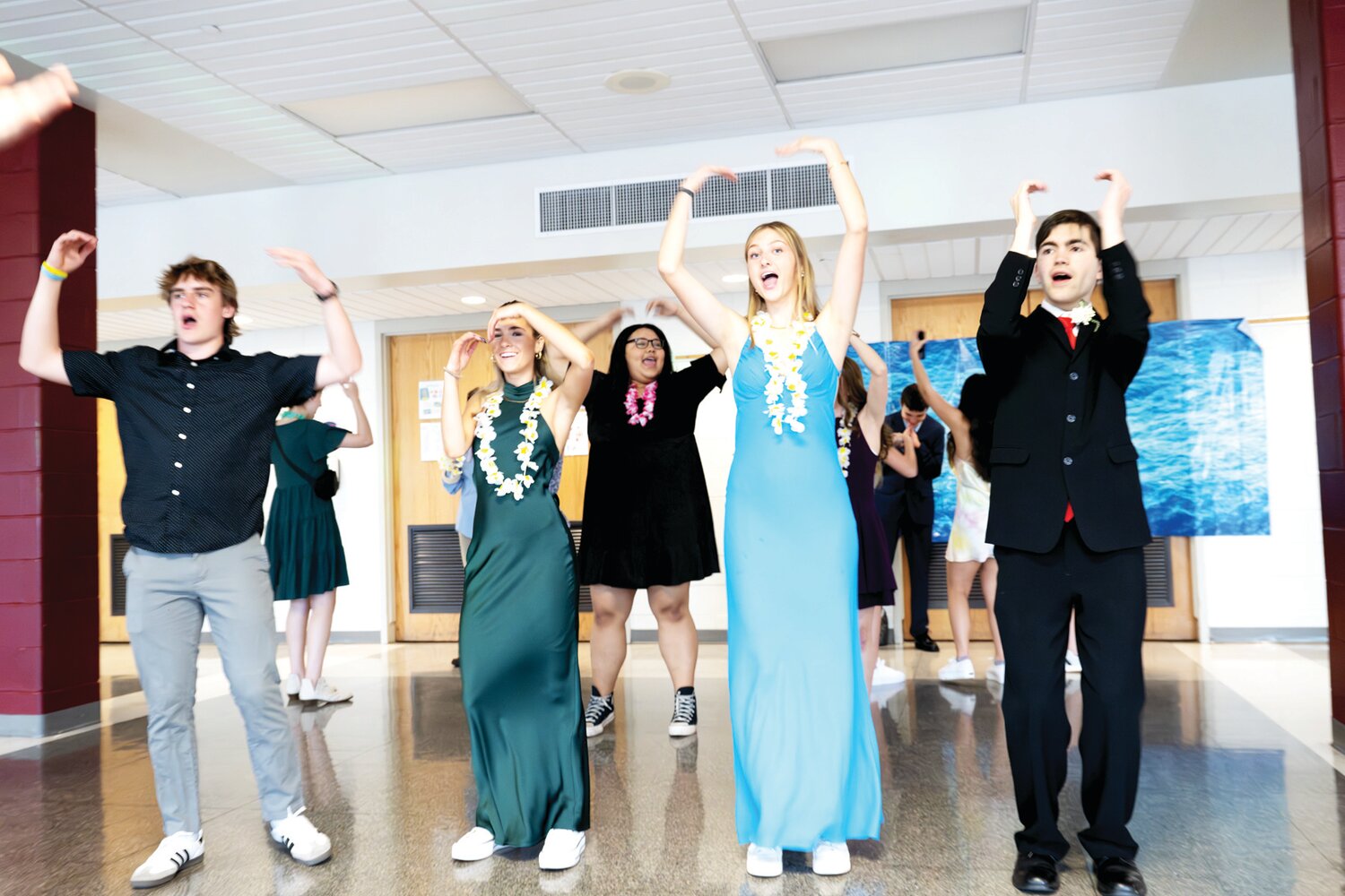 Matt Karpinski, Ava Firefly, Sydney Ralph and Charlie Reimer dance to the Village People’s “YMCA” during Central Bucks East High School’s first Unified Prom March 15.