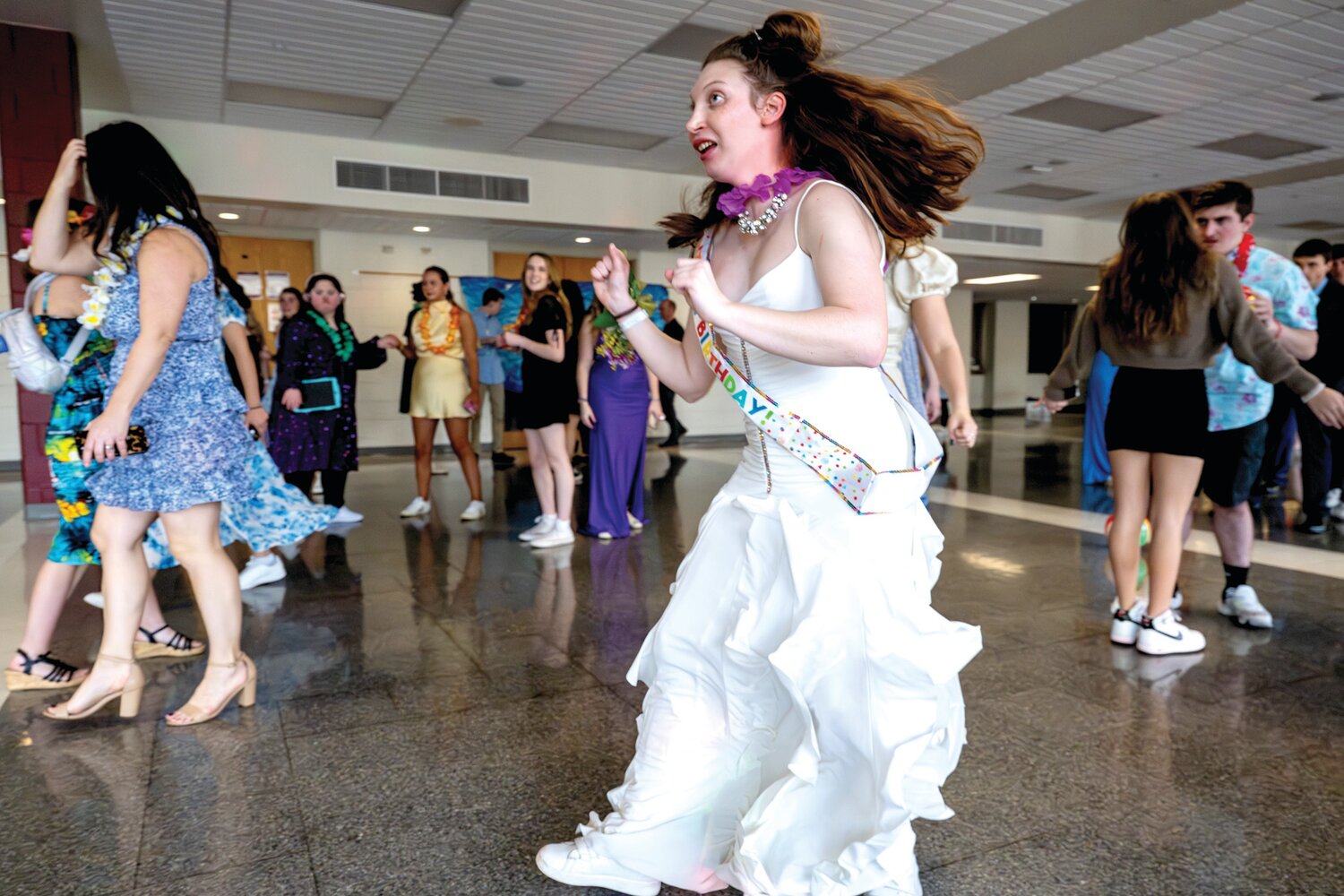Charlotte Brock celebrates her birthday and enjoys dancing at Central Bucks East High School’s first Unified Prom.