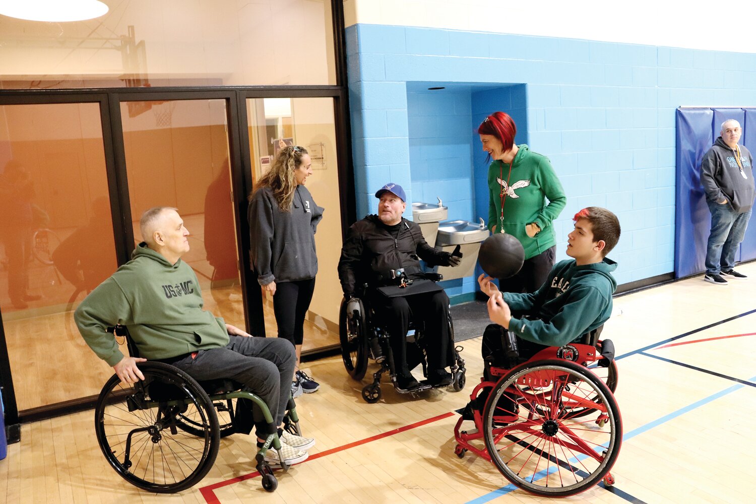Veterans Pathway Program participants prepare for wheelchair basketball in Doylestown at the YMCA of Bucks and Montgomery Counties.