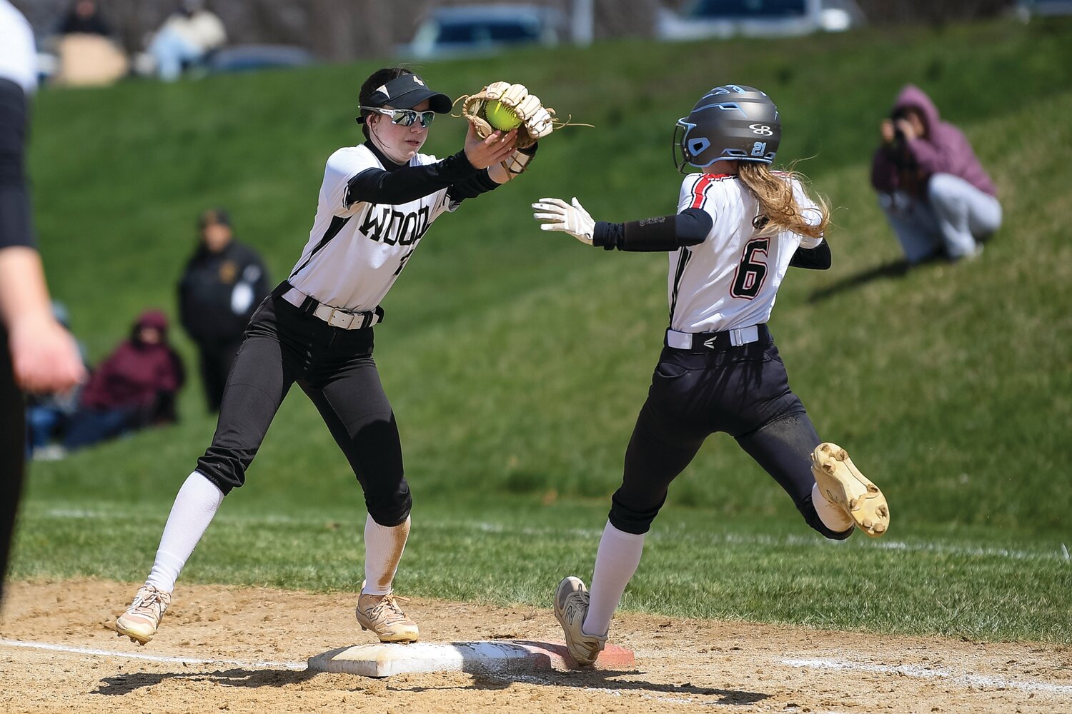 Archbishop Wood’s Maura Yoos fields a throw to first in time to get William Tennent’s Sydney Teufel in the third inning.