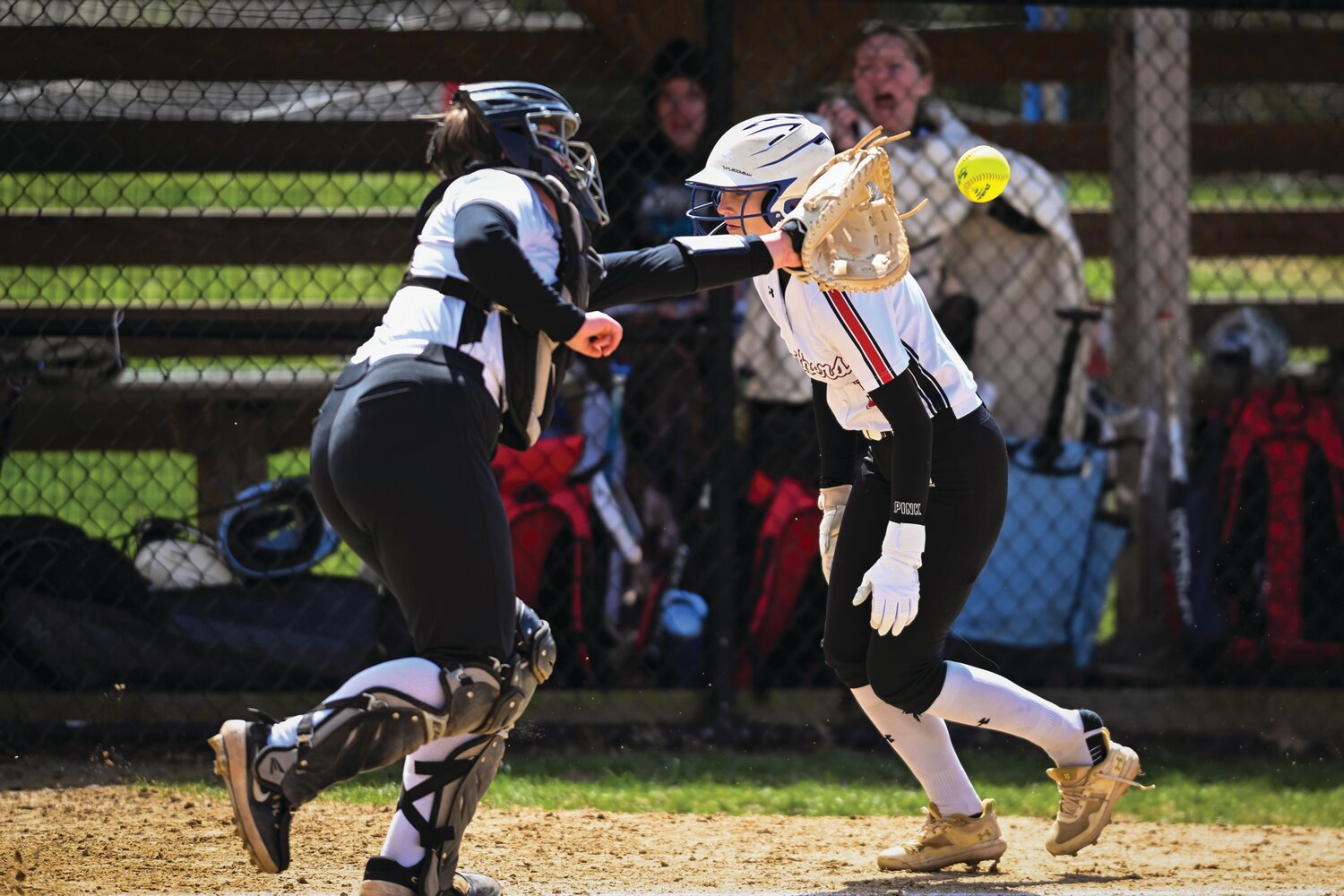William Tennent’s Madison Pirolli avoids Archbishop Wood catcher Sophia Azzarano losing her spike in the process and scoring the game-winning run in the bottom of the sixth inning.