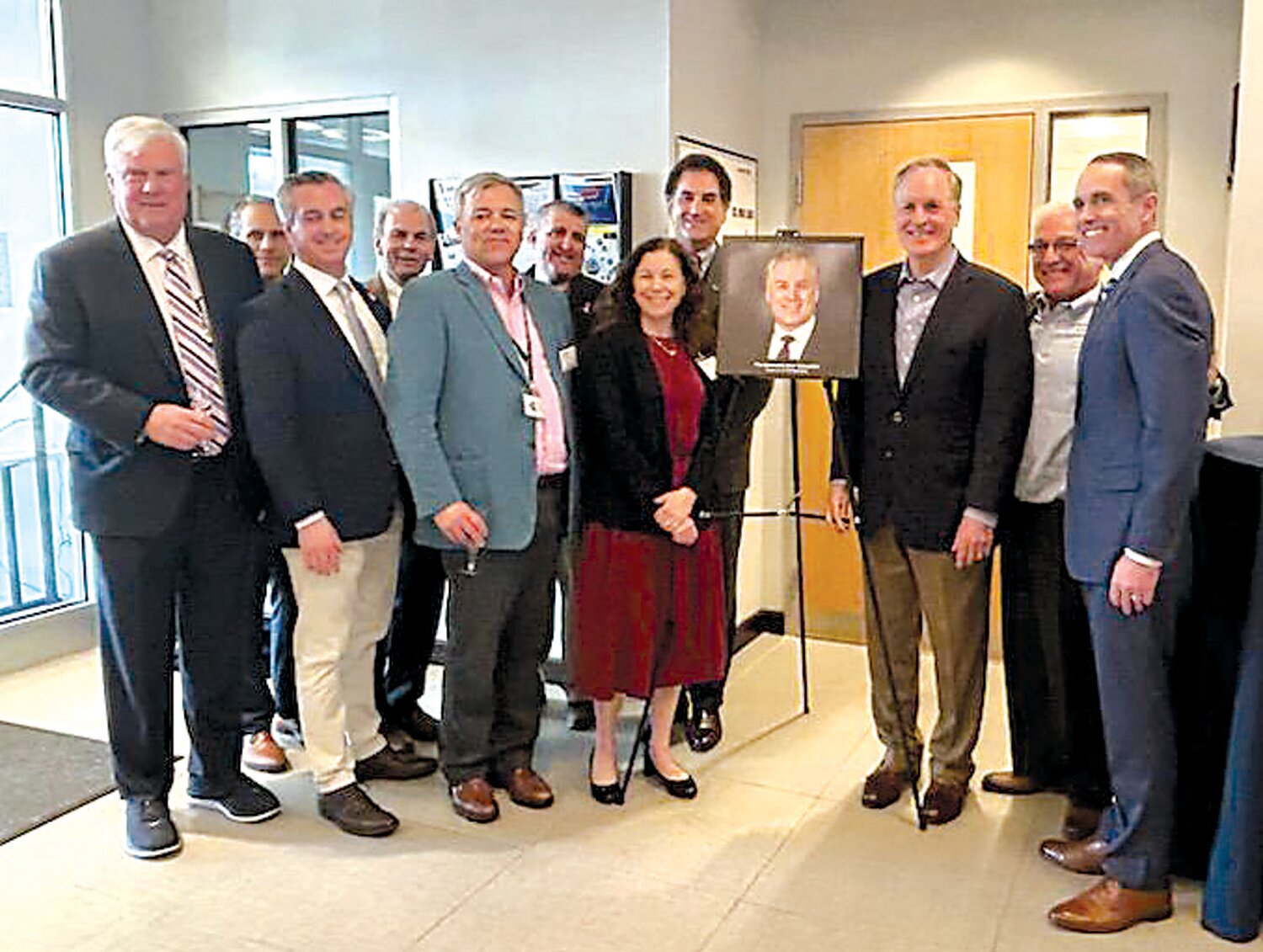 At the PA Biotechnology Center’s unveiling of a portrait of Mark Schweiker, the former Pa. governor stands with former U.S. Rep. Jim Greenwood, Pa. Sen. Steve Santarsiero and other local officials who attended Schweiker’s induction into the center’s Public Service Wall of Fame.