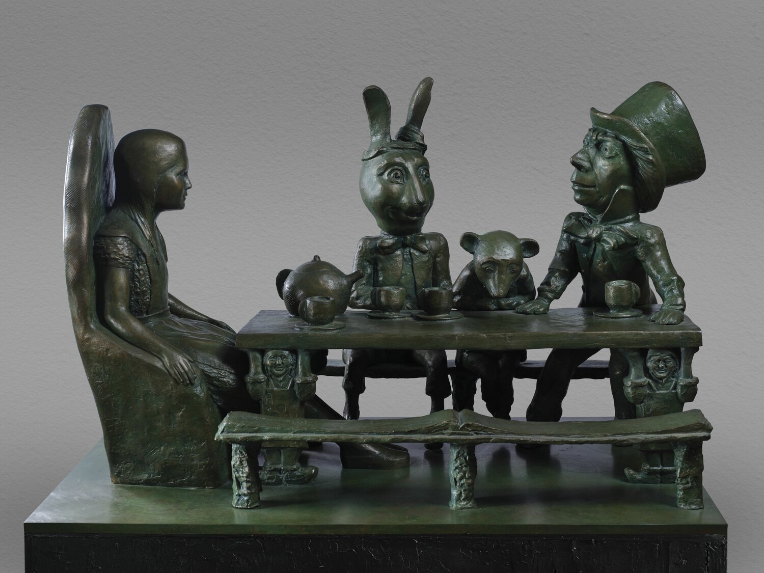 “Tea Party” (maquette), 1996-97, in bronze, edition 1/9, is by George R. Anthonisen (b. 1936).
