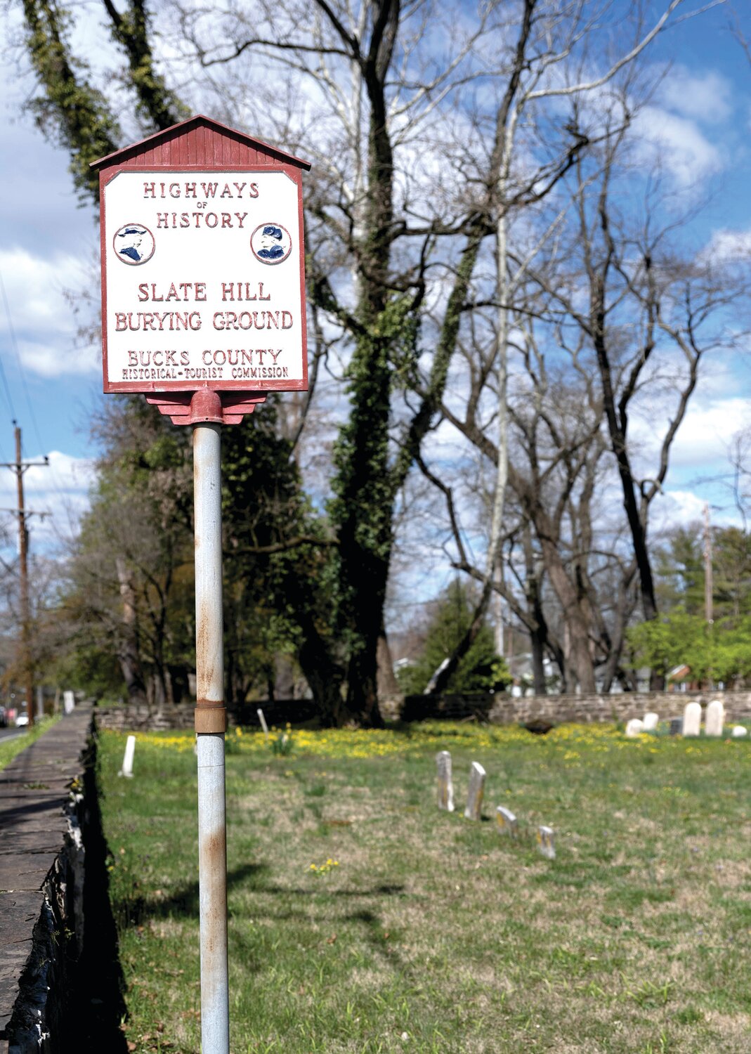 A small sign marks the location of Slate Hill Burying Ground on Yardley-Morrisville Road in Lower Makefield.