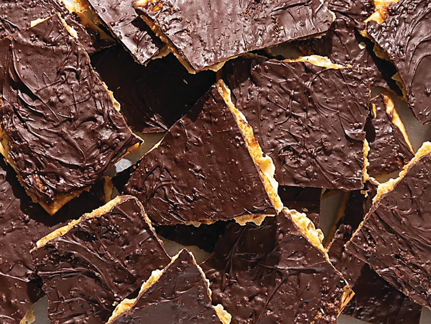 Matzo can be covered in chocolate for dessert. Feel free to add favorite toppings.