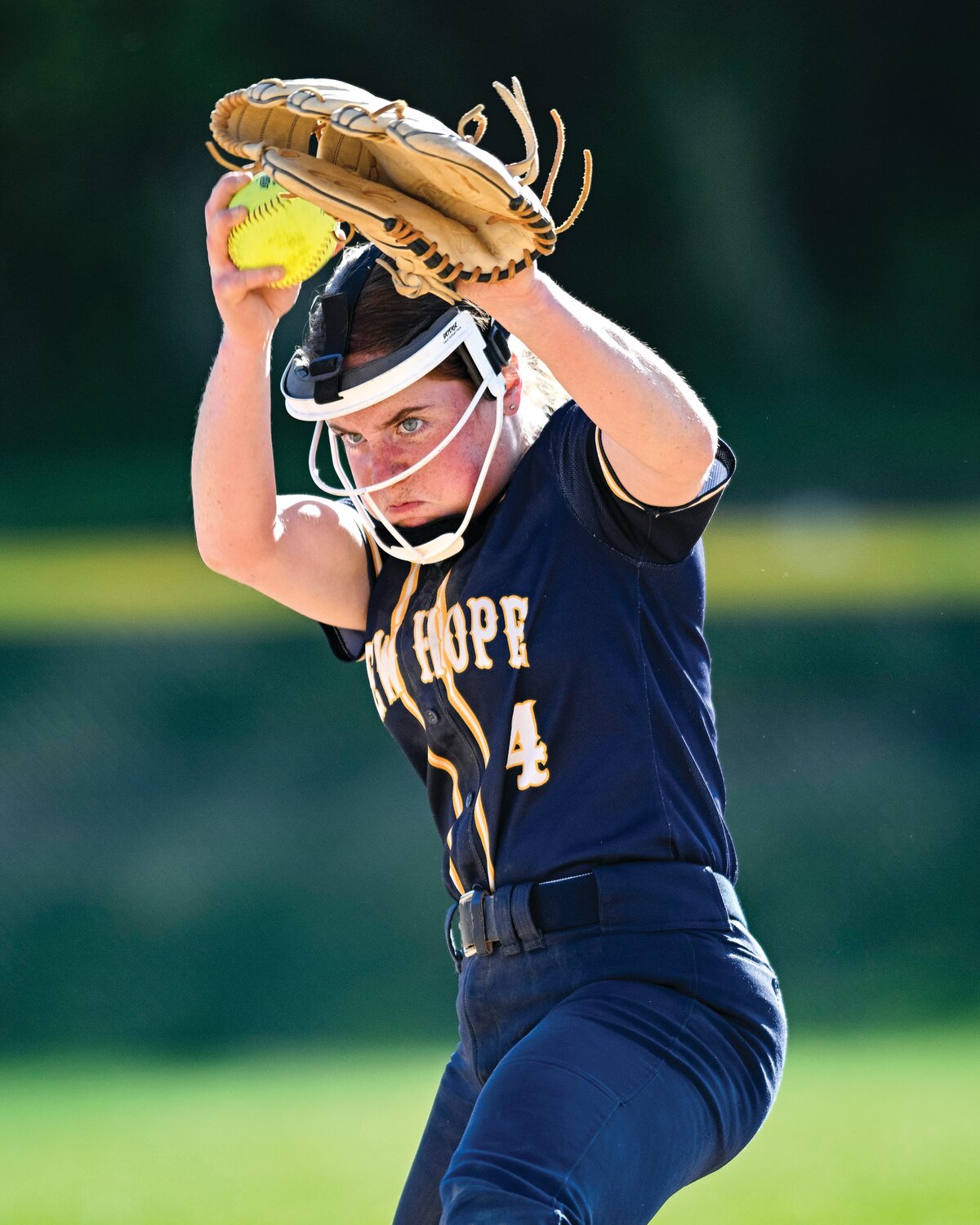 New Hope-Solebury pitcher Mabel Klossner bears down trying to pitch out of a sixth-inning jam.